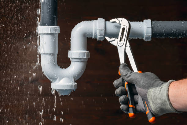 Professional Emergency Plumber technician working in Stem, NC